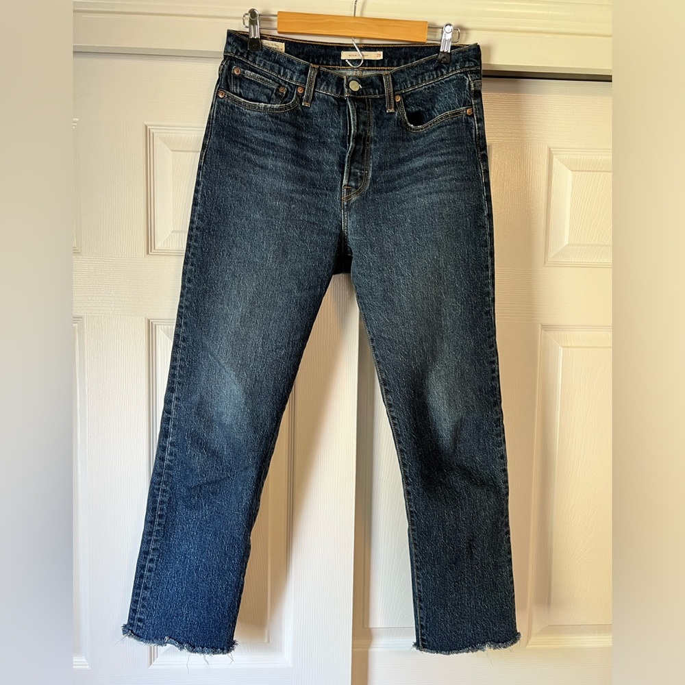 Levi’s wedgie straight fit jeans. 29 x 28. Raw hem. EUC